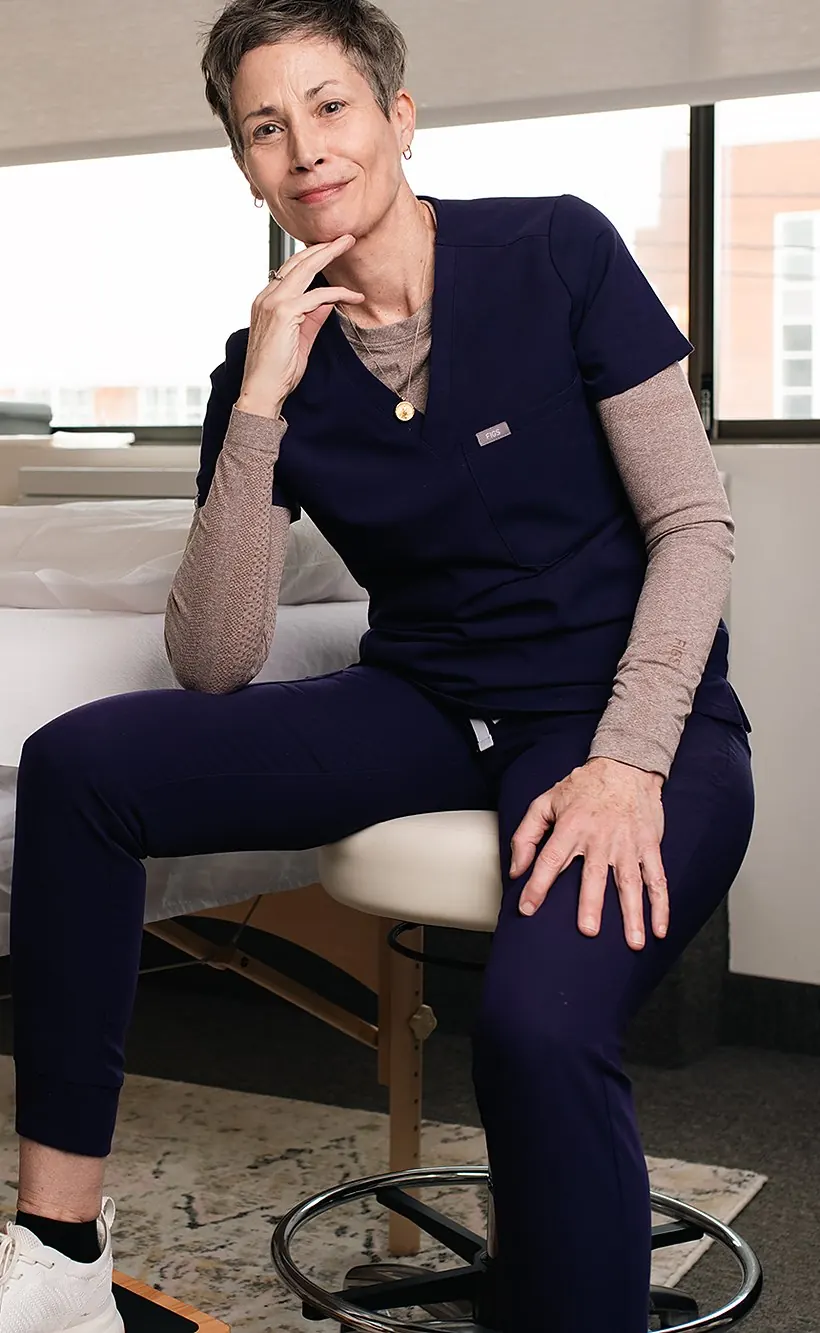 Dana Scarton, L.Ac., founder of The Zen Point, in her Bethesda treatment room