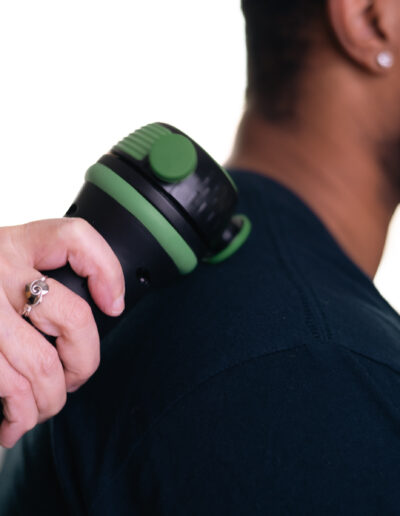 Rapid Release Therapy device applied to a patient’s shoulder for muscle relief